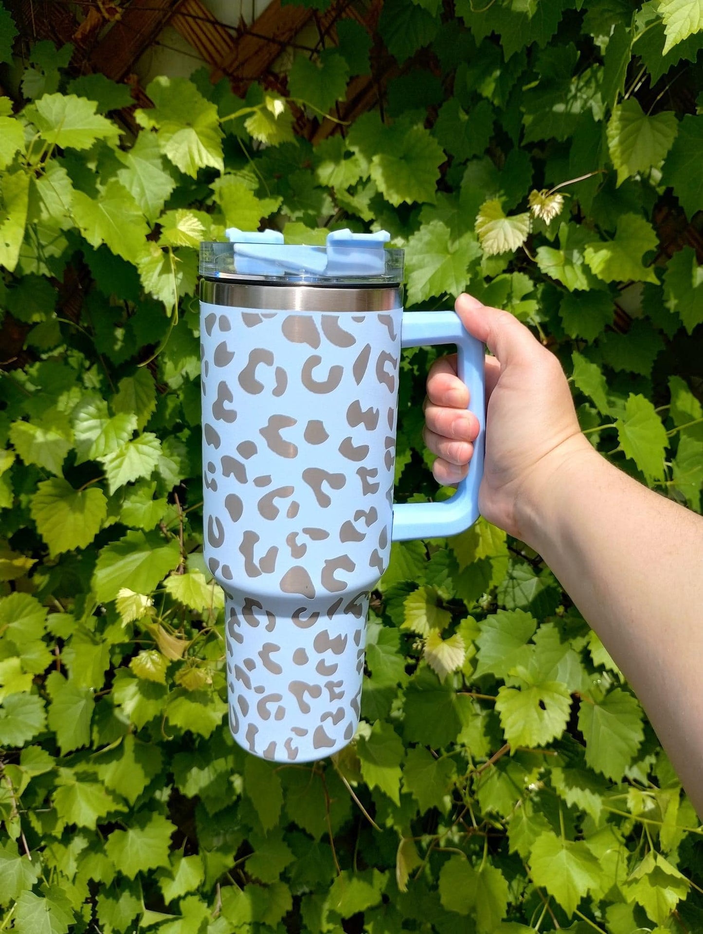 light blue cheetah engraved tumbler